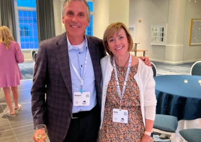 Two individuals at a networking event related to warehousing and fulfillment services in the United States.