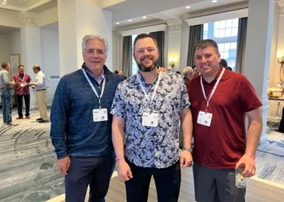 Three team members at a warehousing and fulfillment services event in the United States.